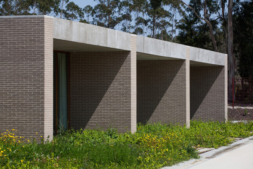 bricked volumes comprise fonte de angeão school in portugal by miguel marcelino