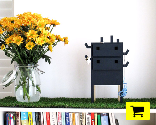 based on a pyramid, nichos holds valuables with ironic gravitas