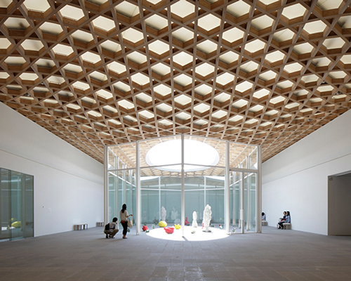 shigeru ban's latticed oita prefectural art museum opens in japan