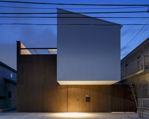 apollo architects extrudes white volume from patio house in japan