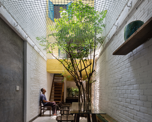 a21 studio supports individual dwellings within saigon house in vietnam
