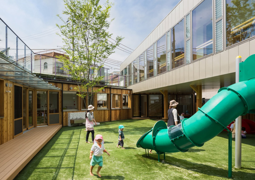 tadashi suga articulates takeno kindergarten around a courtyard playground