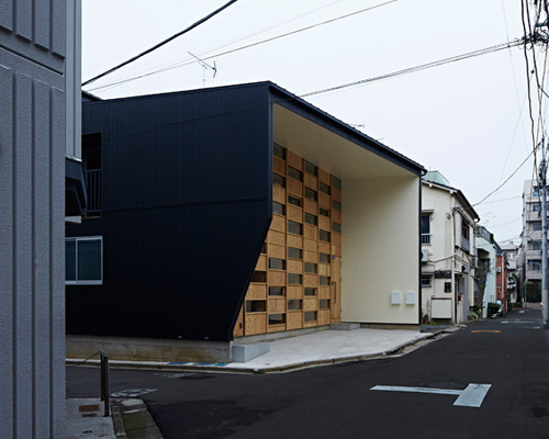 takeshi shikauchi's checkered house brings wood back to urban japan