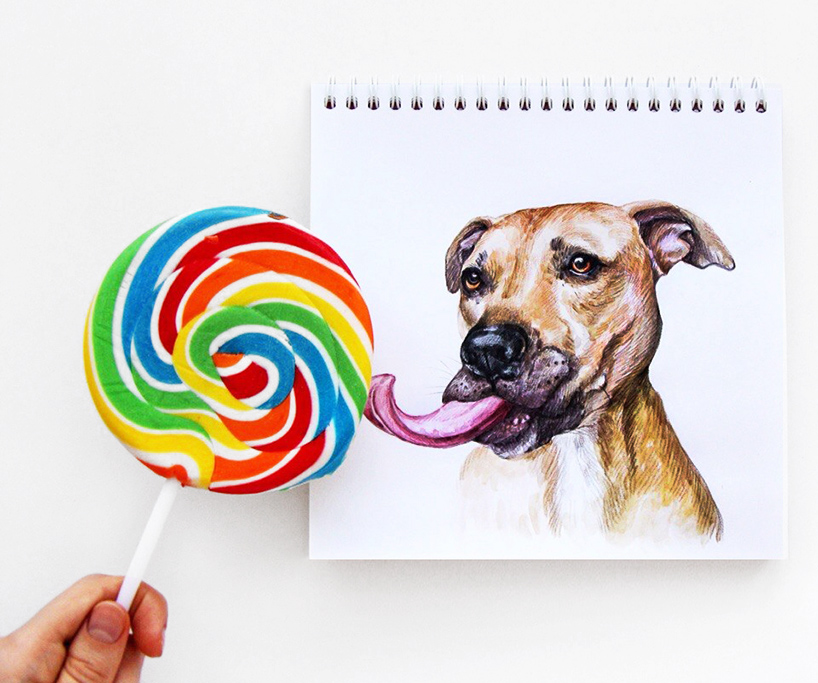 interactive illustrations connect drawn dogs with human hands
