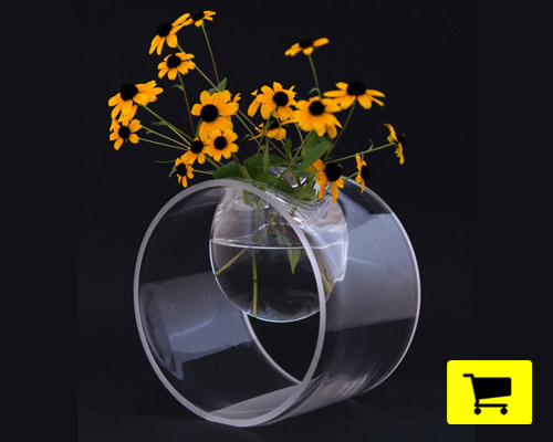 orbital vase combines contemporary form with traditional glass blowing
