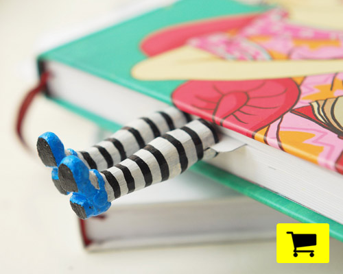 alice in wonderland bookmark disappears amongst the pages