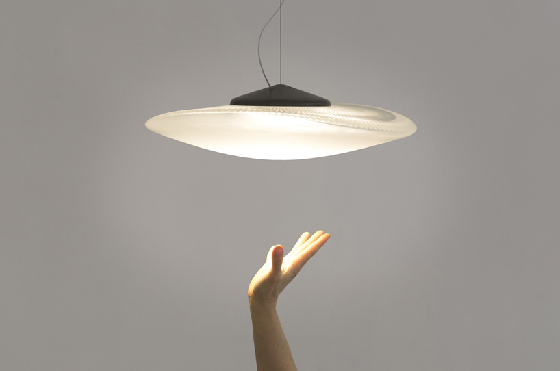 constance guisset forms playful glass loop lamp for fabbian