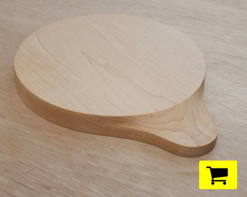 loop cutting board features organic and geometric shaped sides