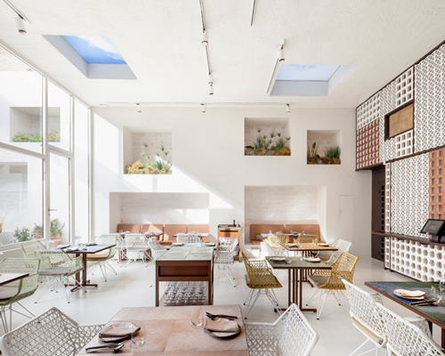 el equipo creativo adorns disfrutar restaurant with ceramic tiles in barcelona