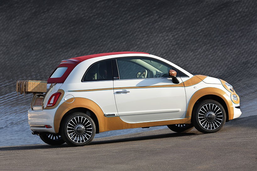 fiat make bespoke 500 model in hallmark italian leather and wood