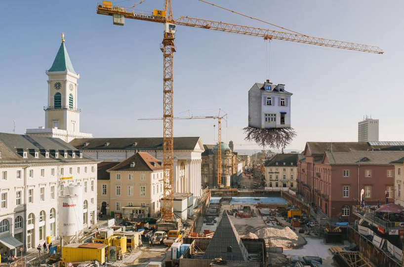 leandro erlich's house is pulled by the roots in karlsruhe