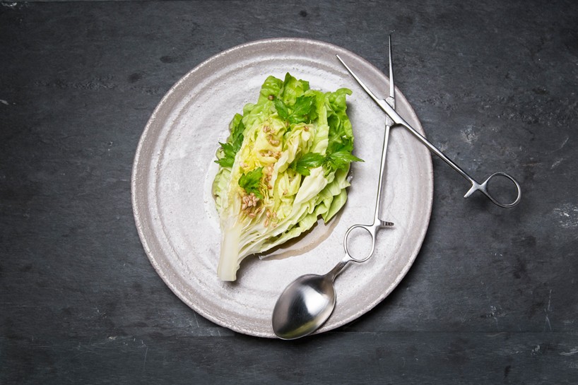 diners use distinctive cutlery for steinbeisser's experimental gastronomy