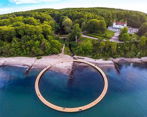 gjøde & povlsgaard arkitekter elevates the infinite bridge over danish coast