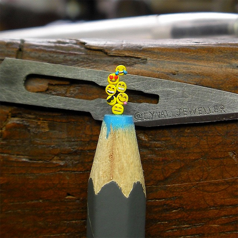 tom lynall carves miniature emojis and icons from colored pencil tips