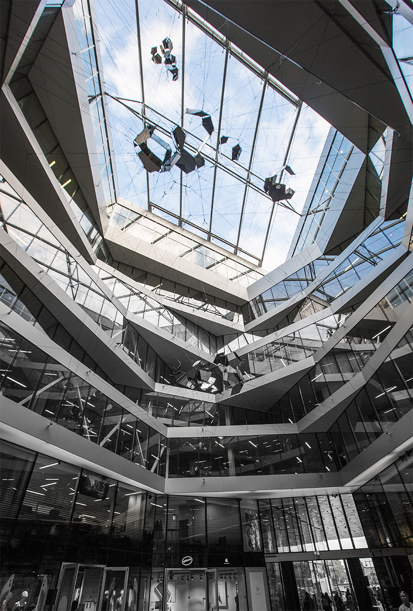 tomás saraceno suspends sundial for spatial echoes at aker brygge in oslo