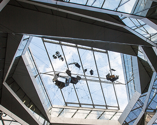 tomás saraceno suspends sundial for spatial echoes at aker brygge in oslo