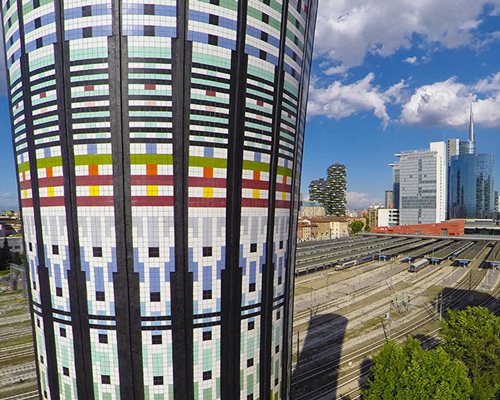 milan's rainbow tower is clad with over 100,000 ceramic tiles