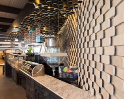 taller david dana architects suspends rice bowls over yumi yumi restaurant