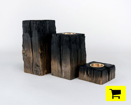 firewood candle holder incorporates charred wood