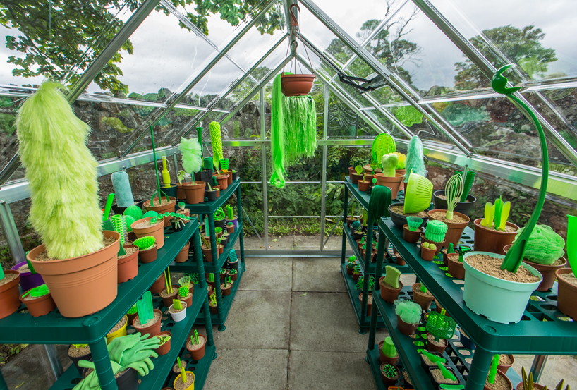 PUTPUT plants a greenhouse filled with faux flora and fauna