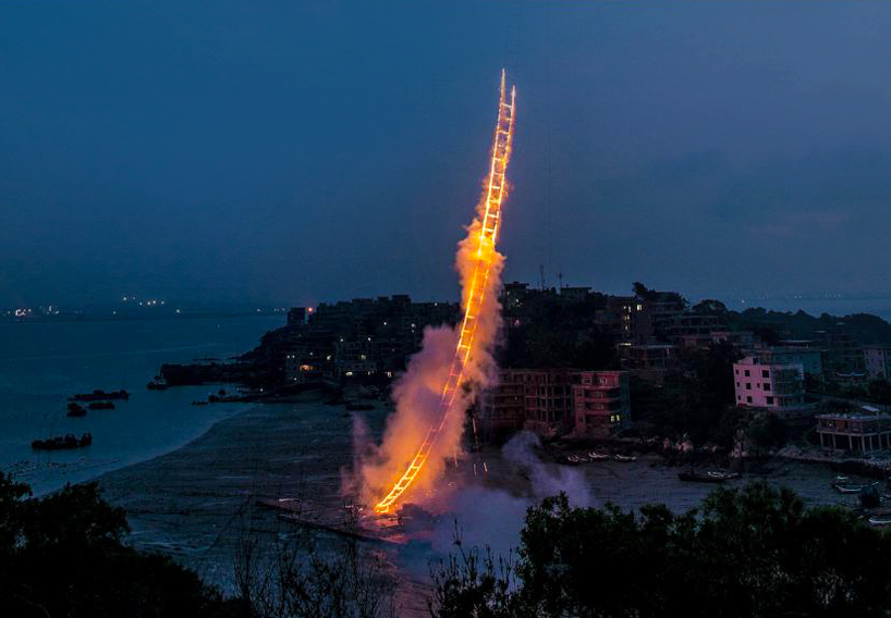 cai guo-qiang sends flaming sky ladder soaring 500 meters in the air