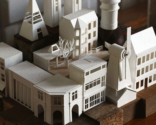 charles young meticulously builds a moving, miniature paper metropolis