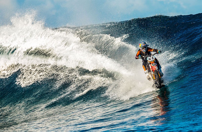 motorcross athlete robbie maddison rides waves with his dirt bike