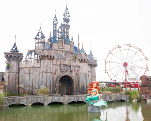 banksy opens dismaland: a dark and twisted bemusement park