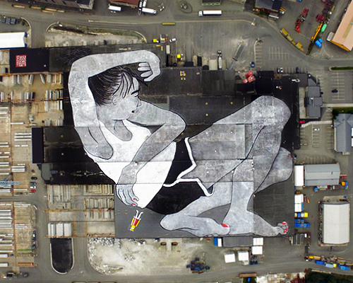 ella & pitr paint the largest mural in the world for nuart festival in norway