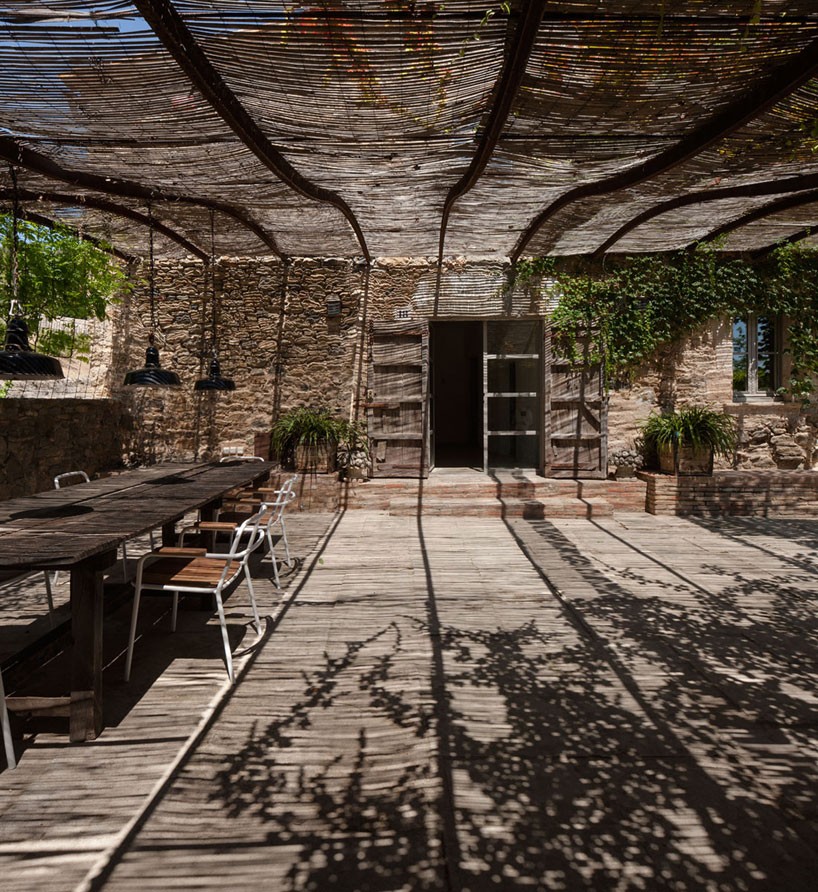 francesc rifé highlights rustic qualities of traditional spanish farmhouse