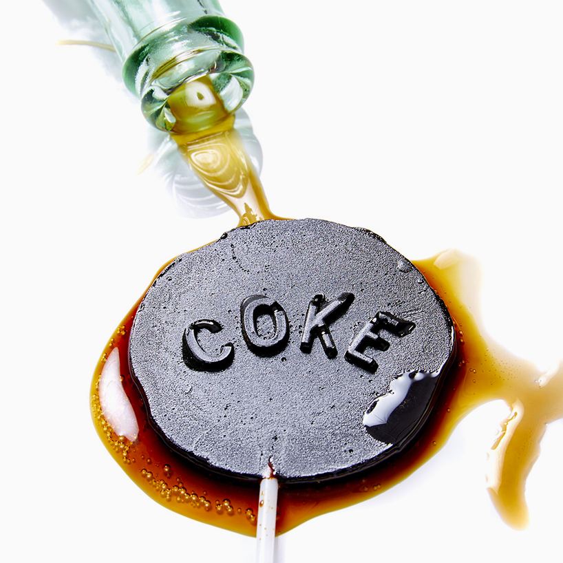 henry hargreaves' over-sized lollipops equate to sugar content in soft drinks