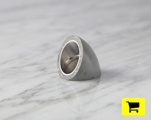 hide ring enwraps fingers with polished and curving form