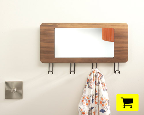 unity seamlessly integrates mirror with coat hangers