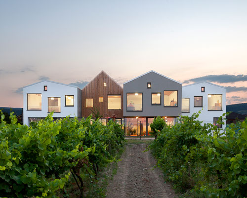 architekti sk's staggered kindergarten overlooks a slovakian vineyard