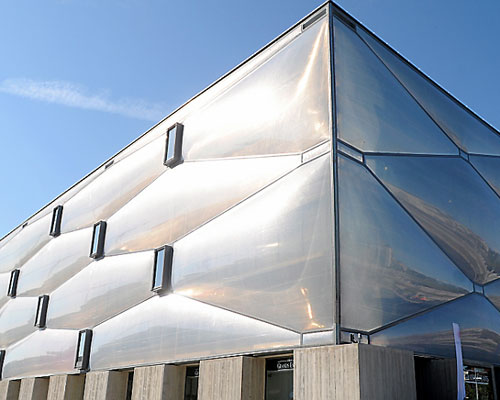 philippe starck wraps le nuage fitness center with a bubble-like façade in france
