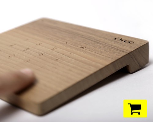 multi touch trackpad and numerical keyboard shaped from wood
