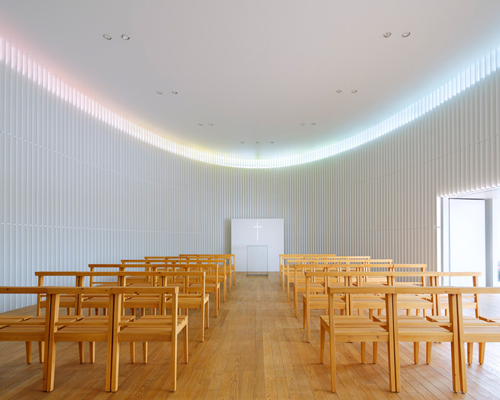 kubo tsushima architects softly illuminates tokyo wedding chapel with rainbow lighting