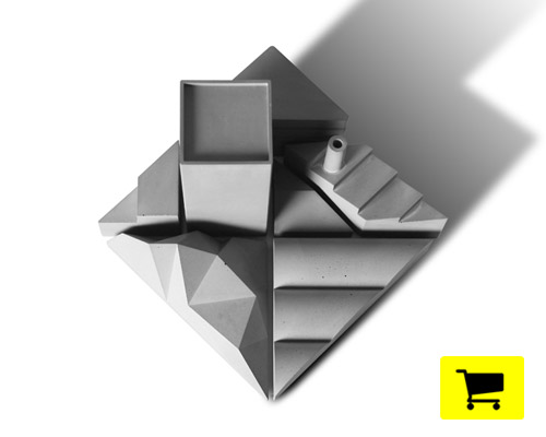 tangram concrete sculpture allows users to create their own cityscape