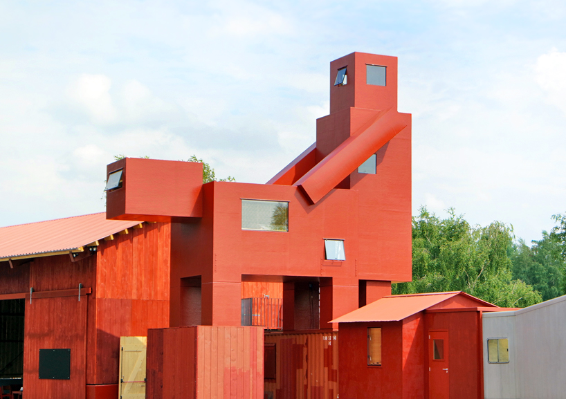 atelier van lieshout sculpts dark and humorous art village for ruhrtriennale festival