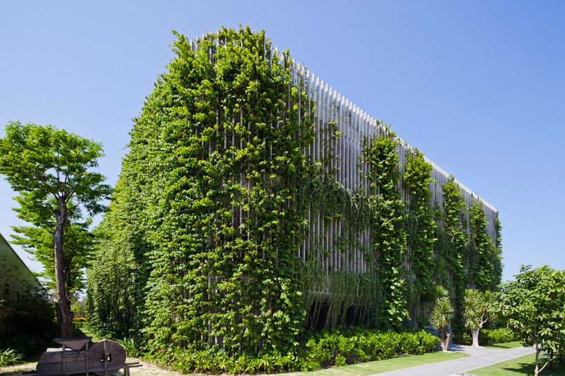 vo trong nghia blends greenery with concrete louvers in vietnamese ...