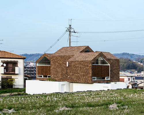 y+M design office clads half of stylobate house with timber shingles in rural japan