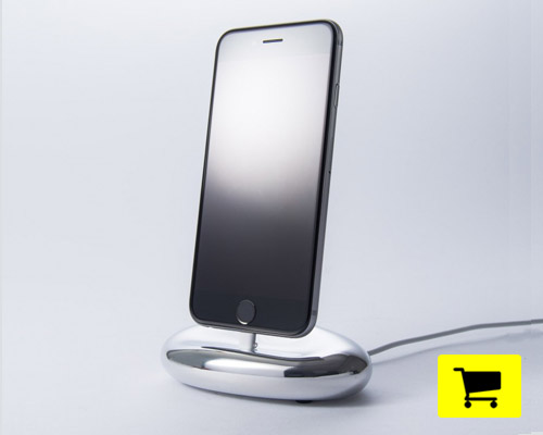 zen charging dock assumes pebble shape with polished aluminum