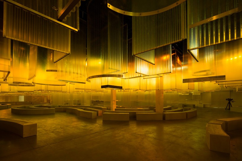AMO sets the stage for prada's SS'16 women's show with indefinite hangar