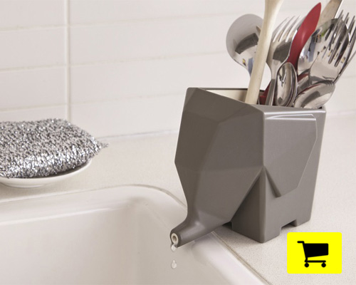 jumbo the elephant drains cutlery via his trunk