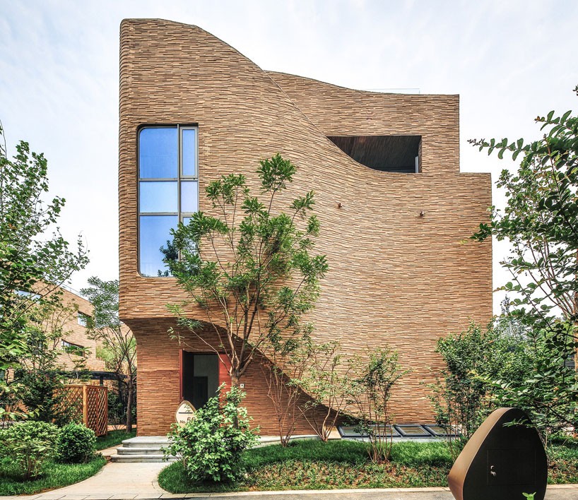 UNStudio defines fairyland guorui villas with sculptural curving façades