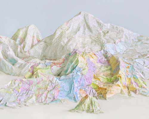 ji zhou constructs environmental illusions with maps and books