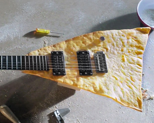 electric tortilla chip guitar is both playable and edible