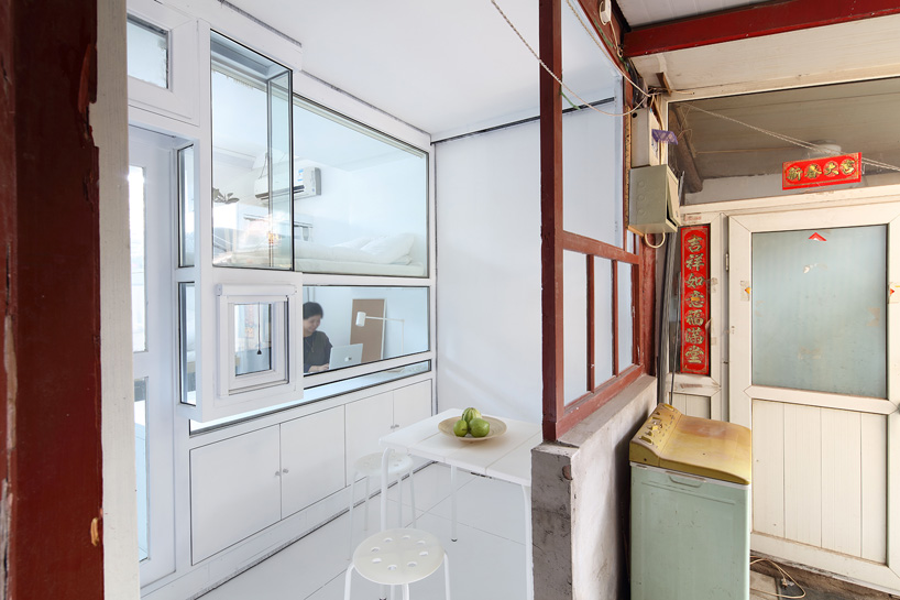humble hostel's movable walls give space back to tiny hutong courtyard