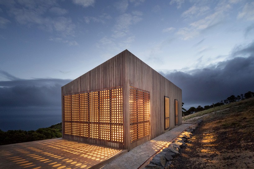 moonlight cabin by jackson clements burrows overlooks australia's coastal landscape