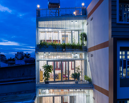mel schenck envelops breeze house's façade with lattice screens in vietnam